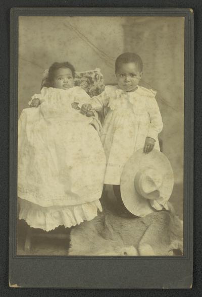 Portrait of unidentified black child and infant