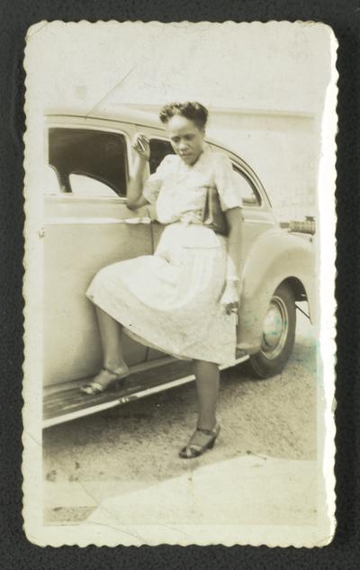 Mrs. Dorothy G. Draper, Dorothy posing with car