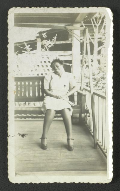 Mrs. Dorothy G. Draper on the porch of Mrs. Christine Brown