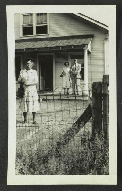 Mary A. Wilson and white doctor and his wife out in country