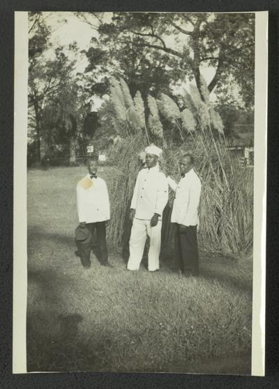 [L to R] Mr. Clarence Davis, F. A. Wilson, and Mr. Hachet down in Bay St. Louis, Mississippi right after the storm