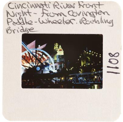 Cincinnati River Front Night - from Covington Paddle-Wheeler. Roebling Bridge