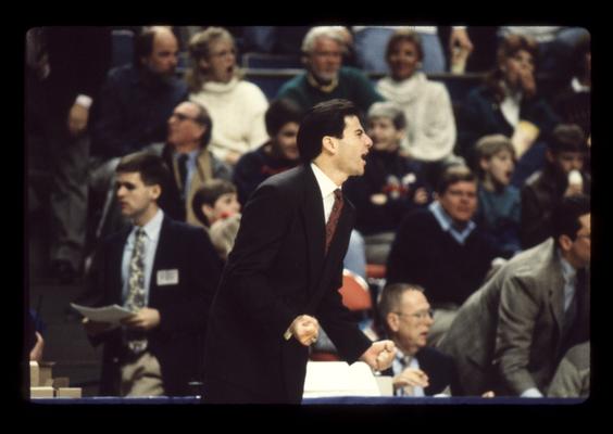 Rick Pitino coaching with clenched fists; UK vs. Ole Miss
