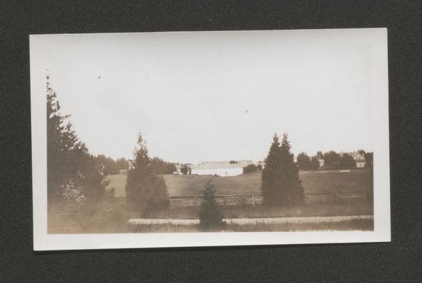 View of trees, a barn and pasture (Duplicate of #43.)