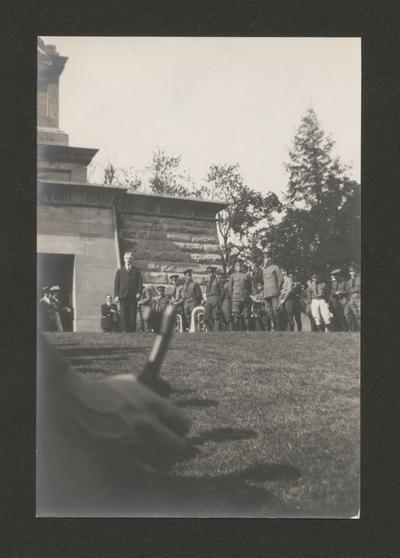 Samuel M. Wilson in center, surrounded by men in uniform (at ceremony)