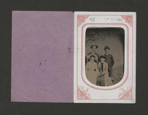 Tin type in paper fold, of two women and two men