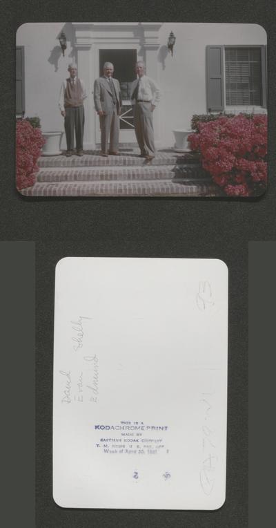 David, Evan and Edmund standing on porch steps (Color photo)