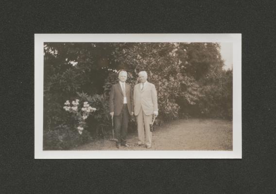 Samuel M. Wilson and a man standing in a garden