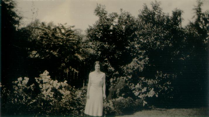 Woman standing in a garden