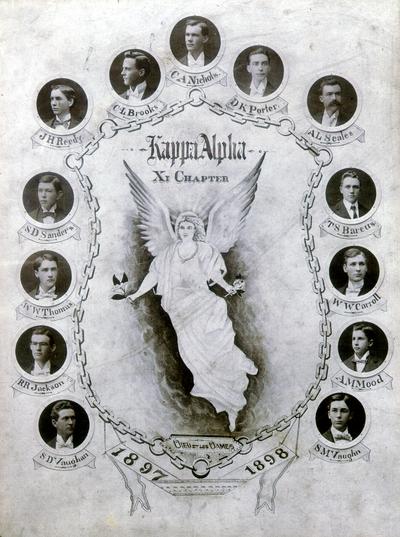 Kappa Alpha Xi Chapter. 1897-1898. Small photos of thirteen young men around a figure of a winged angel. The names in clockwise order: C.A. Nichols, D.K.Porter, A.L. Scales, T.S.Barcus, W.W.Carroll, A.M. Mood, S.M.Vaughn, S.D.Vaughan, R.R.Jackson, W.W. Thomas, S.D. Sanders, J.H. Reedy, C.L. Brooks