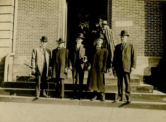 Samuel M. Wilson and four other men standing on the steps to a building