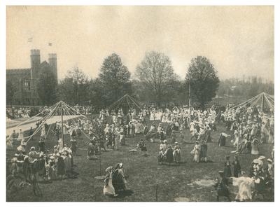 Bryn Mawr College, large field with three maypoles and hundreds of people