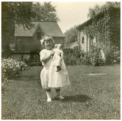Unidentified young girl in garden