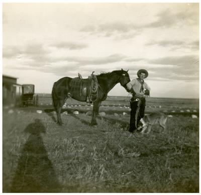 Unidentified man with a horse