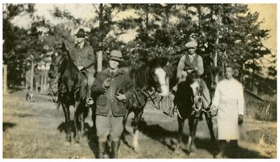 Unidentified men and horse on a hunting trip