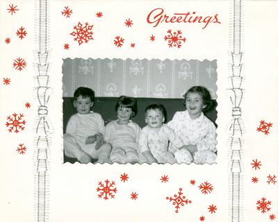 Four children, Christmas Card, handwritten in ink on the paper frame 