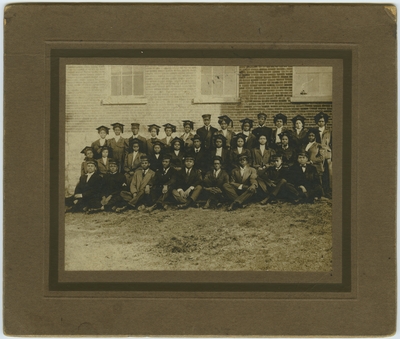 Group of unidentified African American graduates ; written on back 
