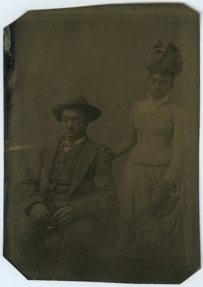 Unidentified African American male and female ; photo located on page 18 of album