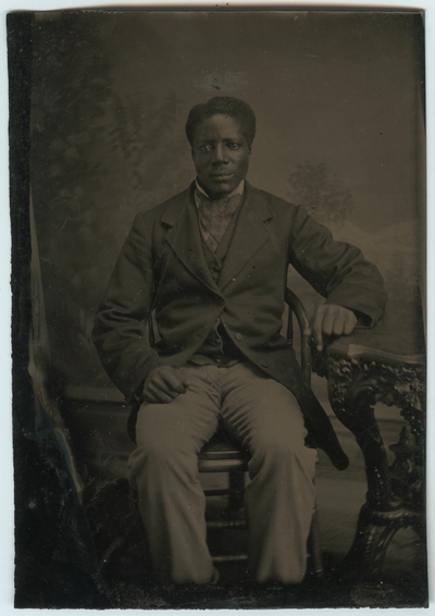 Unidentified African American male ; photo located on page 19 of album