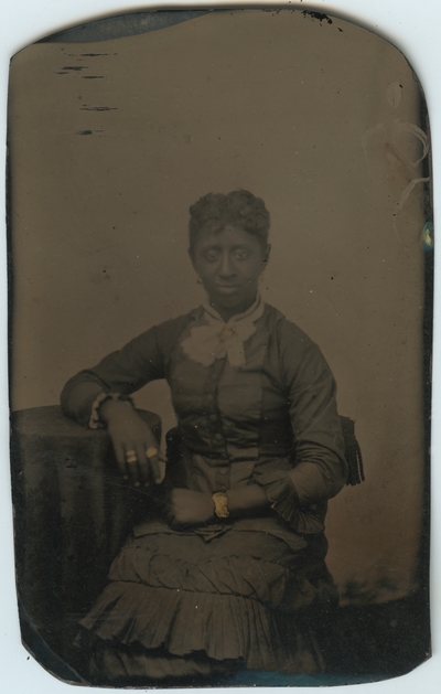 Unidentified African American female ; photo located on page 19 of album