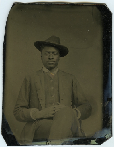 Unidentified African American male ; photo located on page 20 of album