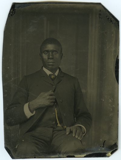 Unidentified African American male ; photo located on page 21 of album
