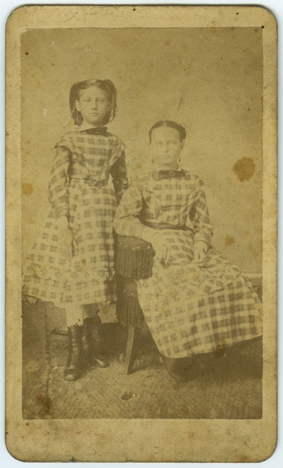 Two unidentified adolescent females ; photo located on page 13 of album