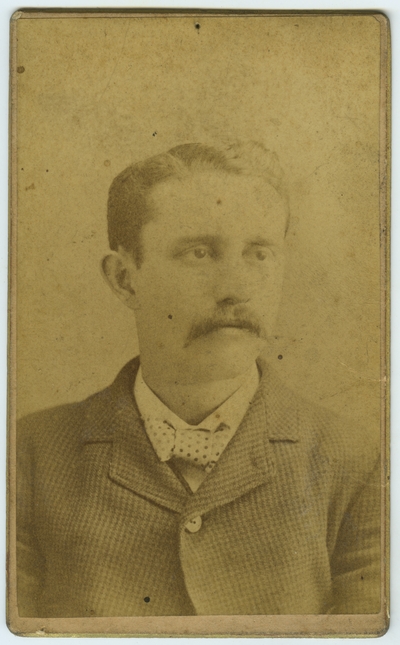 Unidentified male ; photo located on page 13 of album