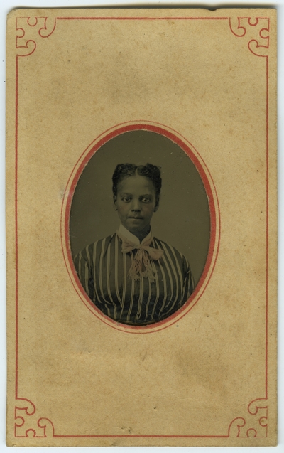 Unidentified African American female ; photo located on page 13 of album