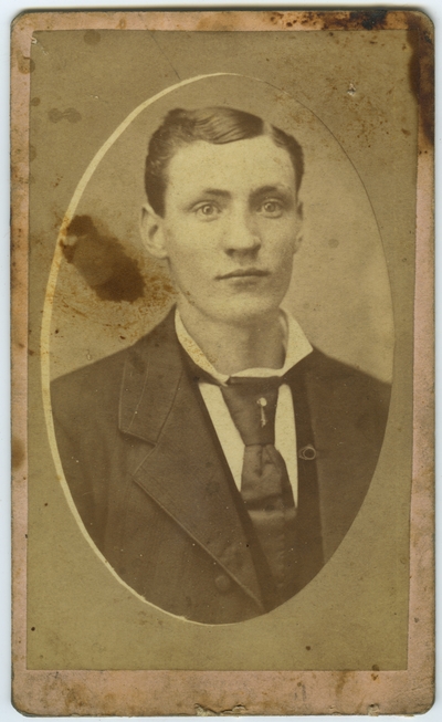 Unidentified male ; photo located on page 14 of album