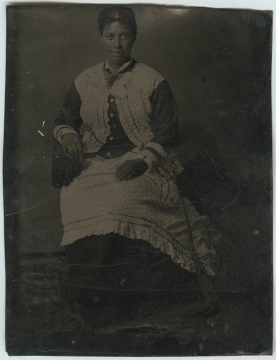 Unidentified African American female ; photo located on page 18 of album
