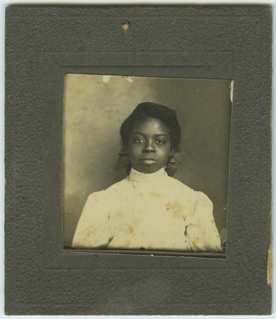 Unidentified African American female ; photo located on page 21 of album