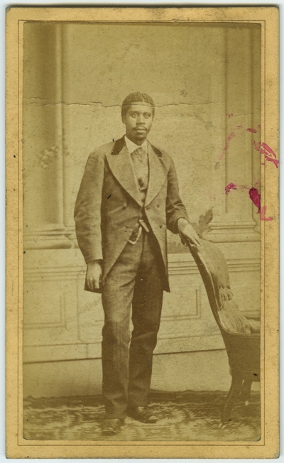 Unidentified African American male ; photo located on page 3 of album