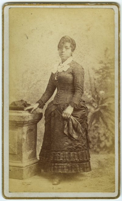 Unidentified African American female ; photo located on page 4 of album