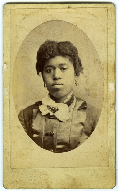 Unidentified African American female ; photo located on page 6 of album