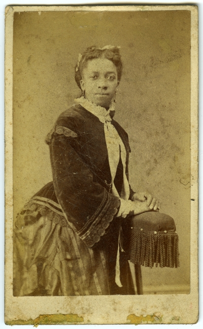 Unidentified African American female ; photo located on page 7 of album