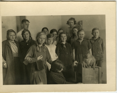Group of children and a primate.  Berlin vicinity School at Woltersdorf bei Erkner.  