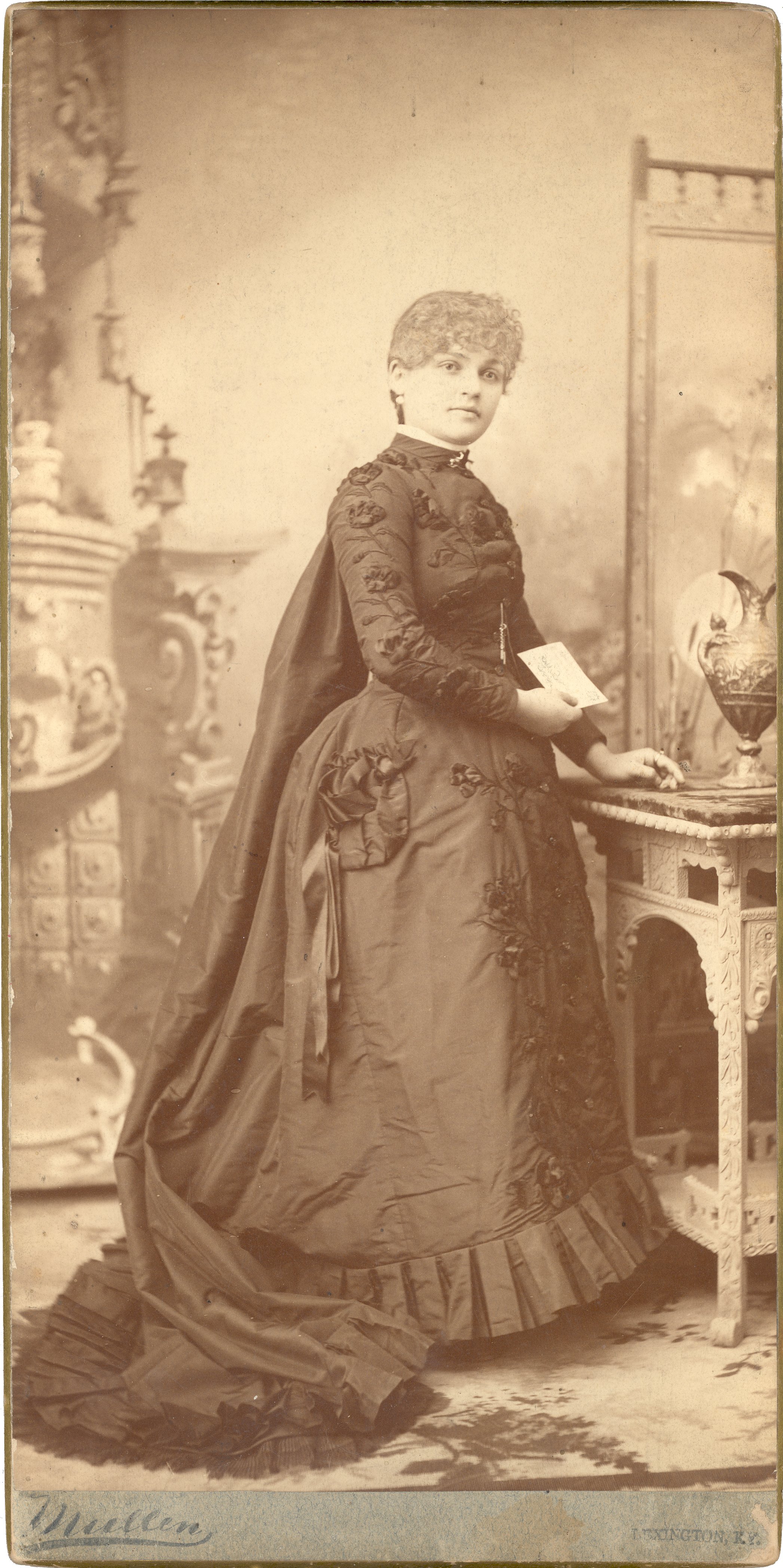 Belle Brezing in a black gown