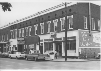 Series S- S1: Taylorsville (Ky.), street scene with Davis Laundry, Little Giant and Stewart's Pool Room