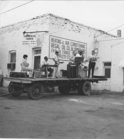 Series S43: Spencer Co. fair, band playing on flatbed truck