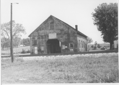 Series S-84-M6: Mercer Co., Bondville, livestock barn next to railroad tracks