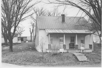 Series S- S7: Spencer Co. (Ky.), clapboard house with TV on front porch