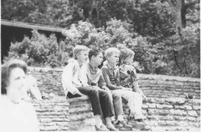 Series Berea-B1: Berea Crafts Fair, 4 boys sitting on rock wall