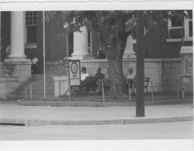 Series S-108-S35: Taylorsville, men in front of courthouse