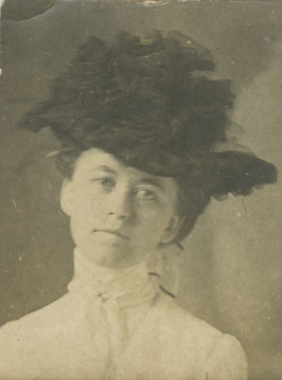 unidentified woman wearing hat