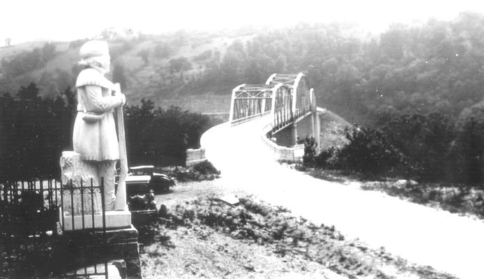 Boonesborough: Daniel Boone statue, bridge in background [with letter July 3, 1942]
