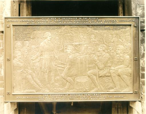 Photograph of plaque. 'All power is originally in the people.' Richard Henderson, Governor of Transylvania, addressing the first Kentucky Legislature at the Transylvania Fort, Boonesborough, Kentucky, May 23, 1775. The Founders of western democracy who were followed by Thomas Jefferson; 'Power belongs to the people.' and Andrew Jackson--'The people must rule.'