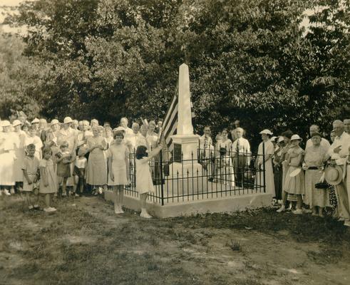 Ruddles Station. 24 June, 1934; Group of people around a monument