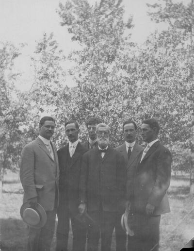 E.P. Shelby (with beard) and five other men