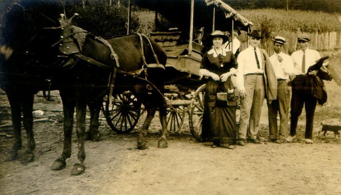 Mary Shelby Wilson, Samuel M. Wilson, and two unidentified men by a horse-drawn carriage